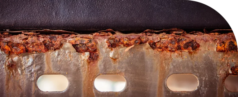 Heavily rusted structural steel channel